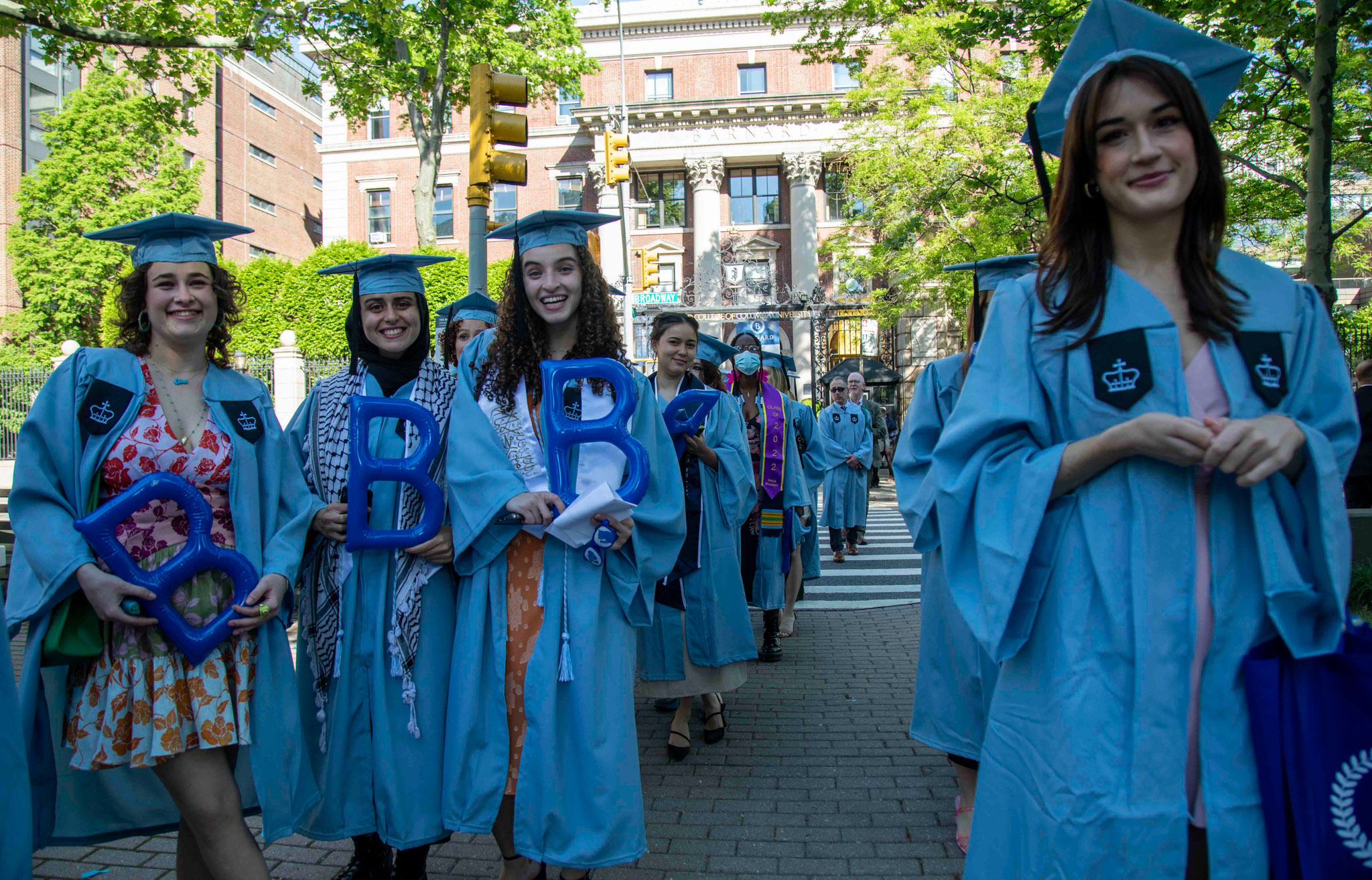 Class of 2022 crossing broadway to commencement