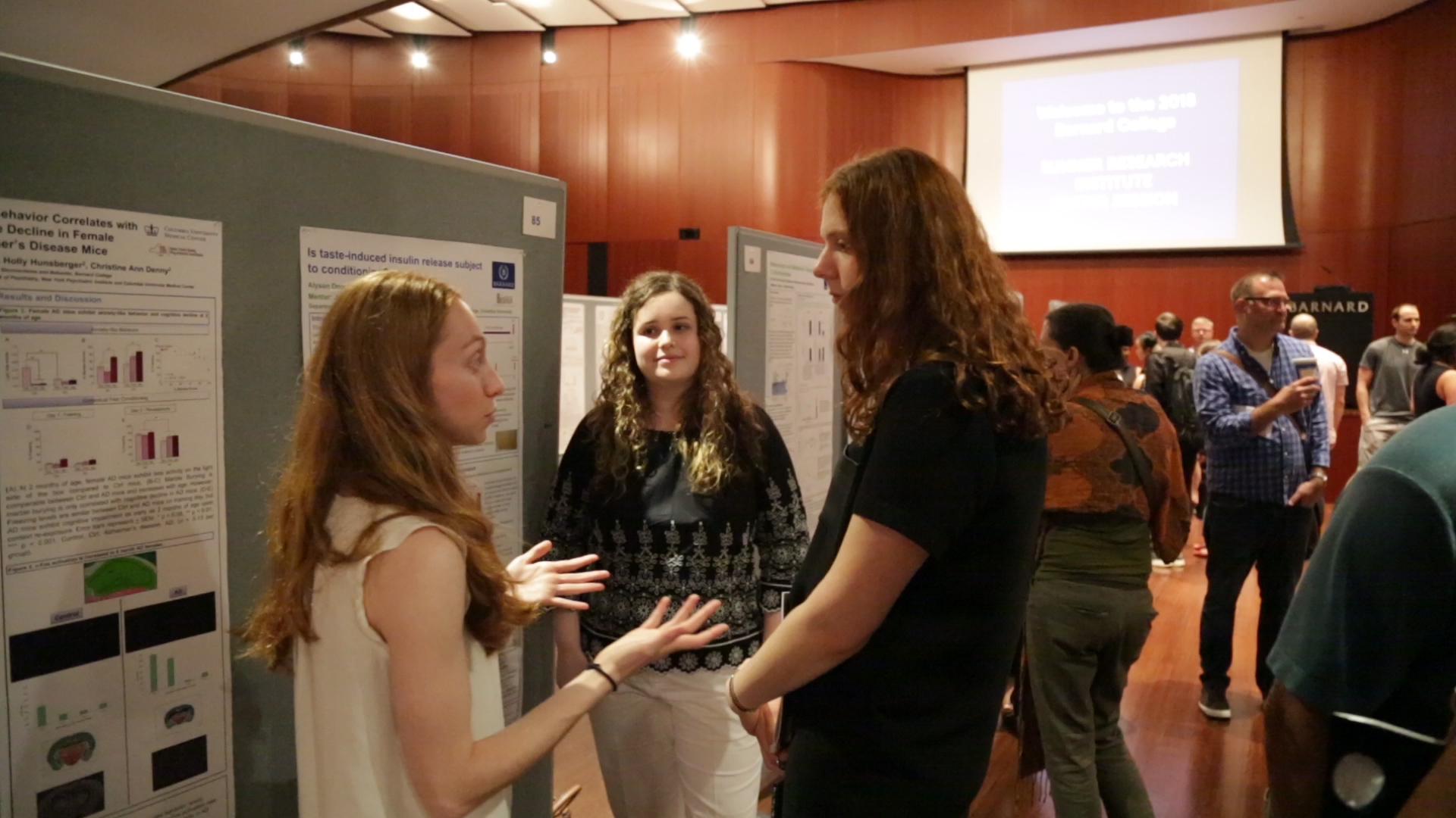 Students discussing research at the 2018 Poster Session