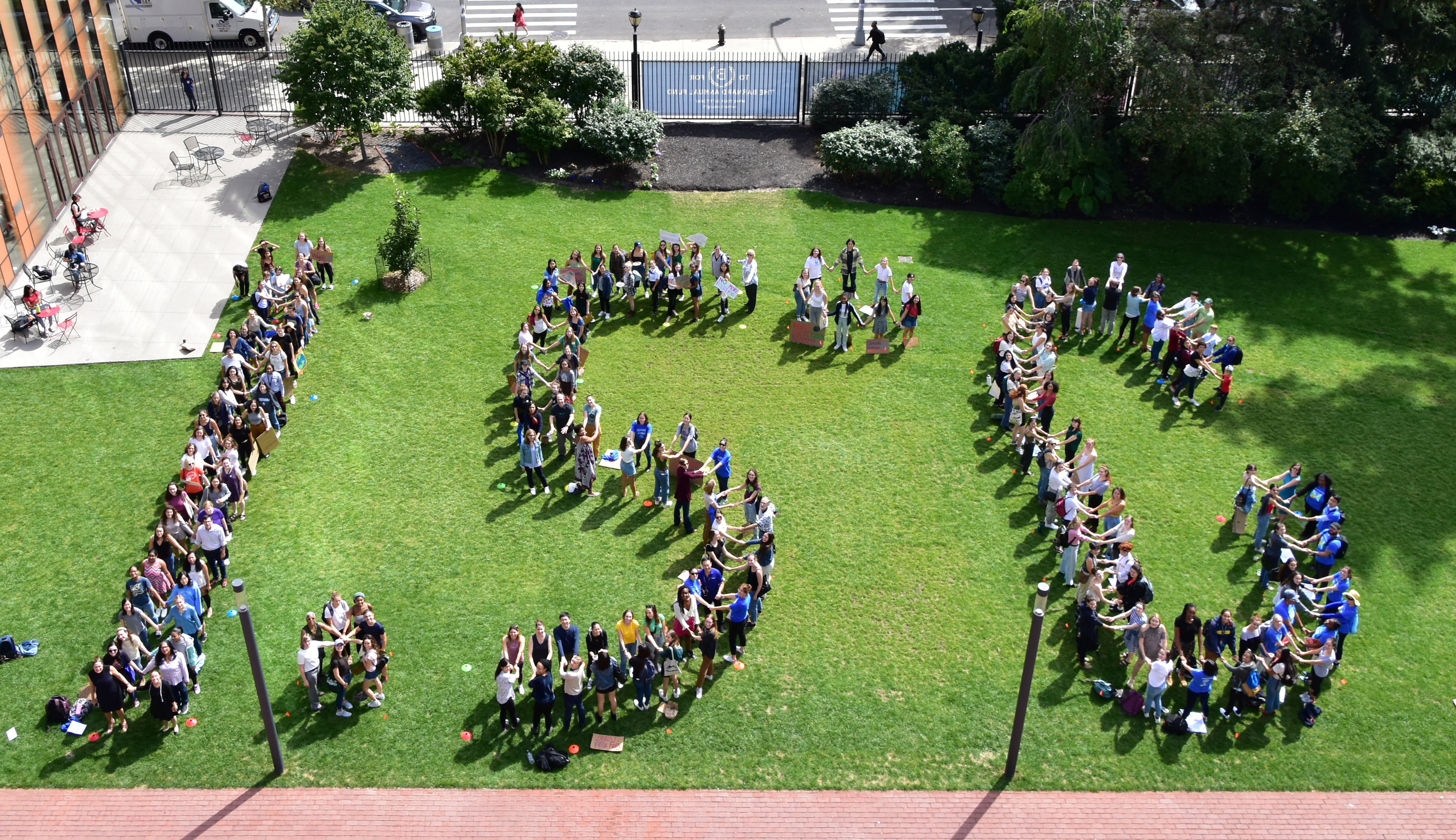 Students pose in the shape of 1.5 degrees celsius on the day of the climate strike