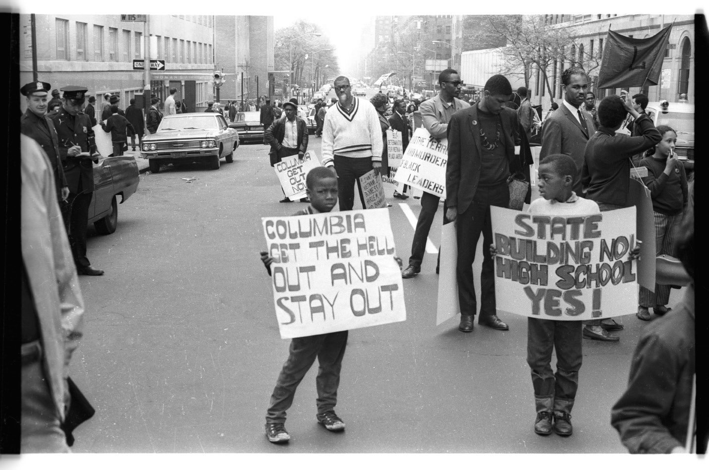 1968 protest, 2 black boys holding signs about Columbia