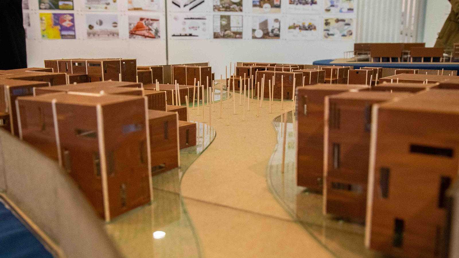architectural models on a table in a classroom