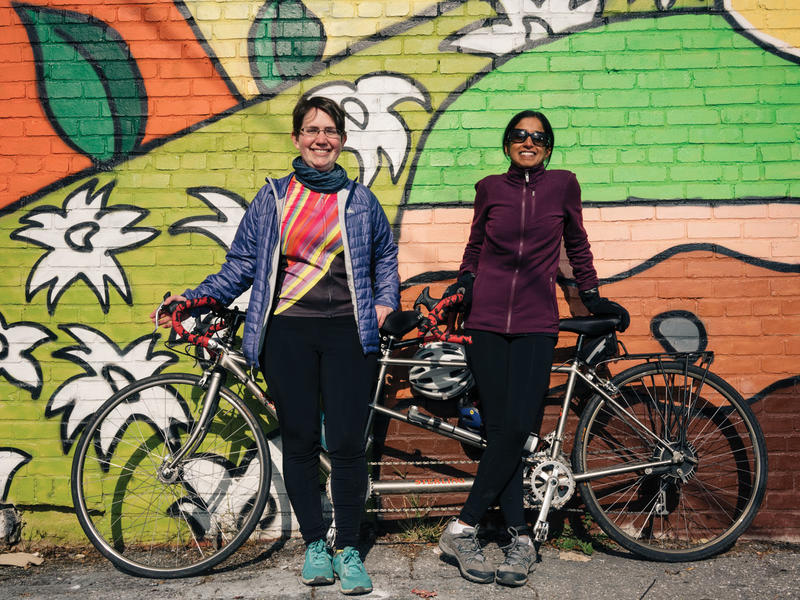 Shira Gordon (L) and Qudsiya Naqui with their tandem bike